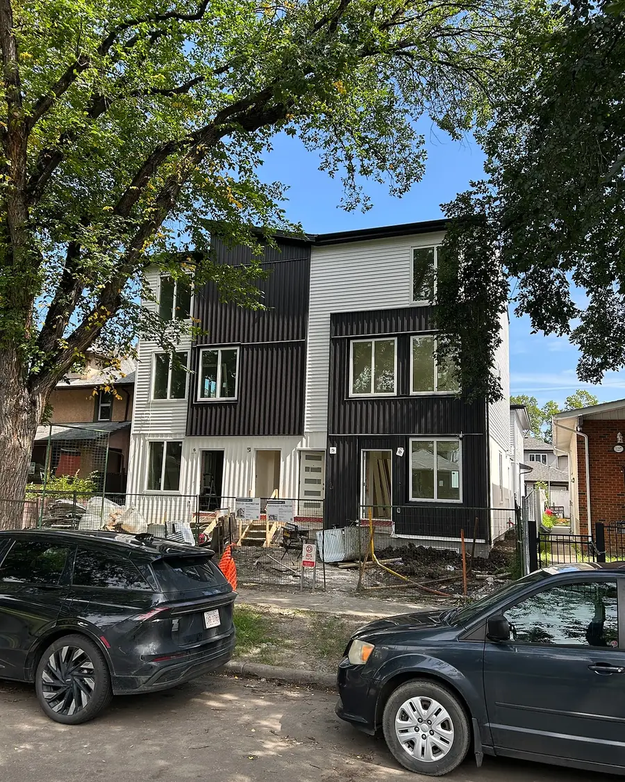 Multifamily infill nearing completion with siding installed